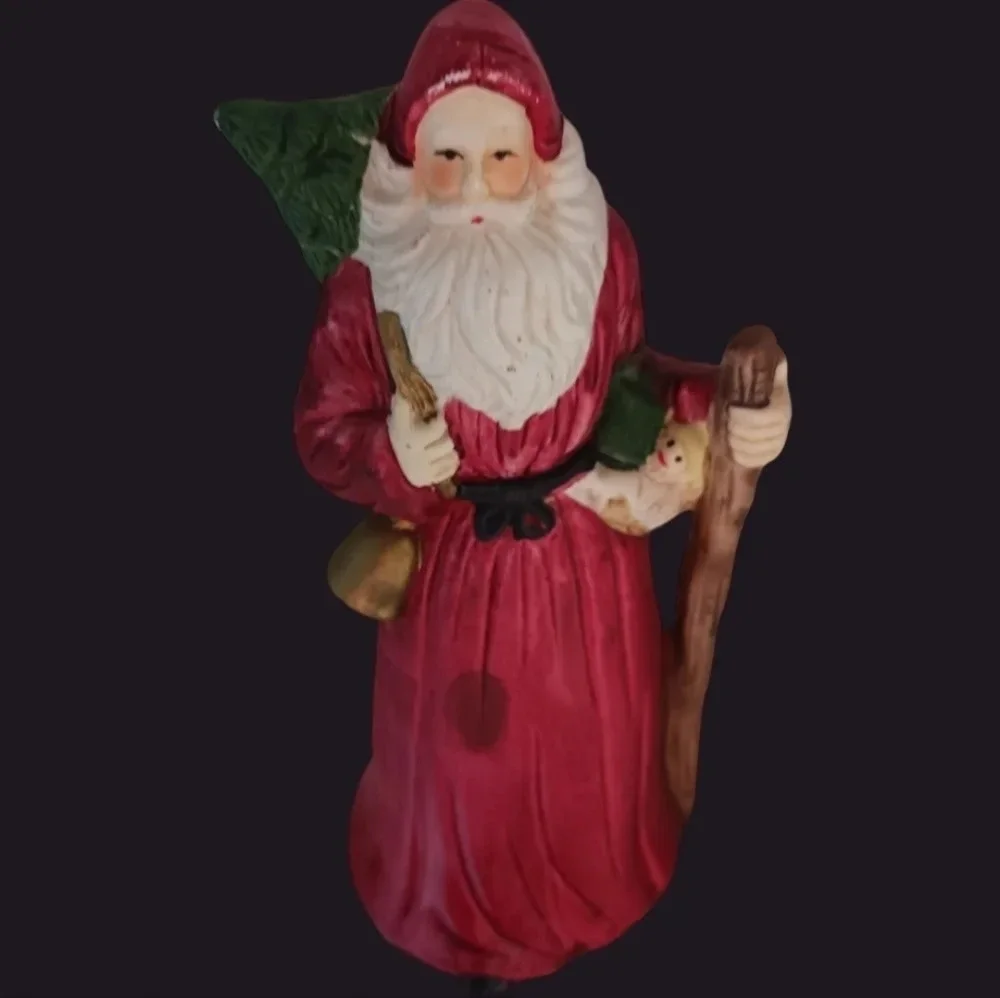 Santa fugurine with bell and christmas tree christmas decor